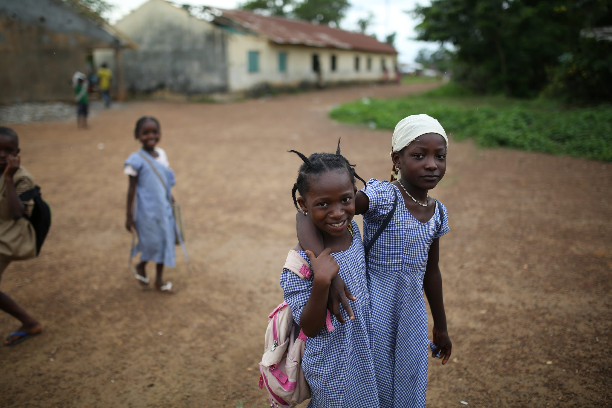 Kids walking the street in Guinea